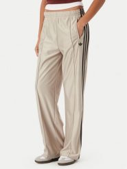 Adidas Spodnie dresowe Metallic Firebird KS9974 Beżowy Wide Leg. Brązowe spodnie dresowe adidas, bez wzorów, z dresówki. Za 369.99 zł.