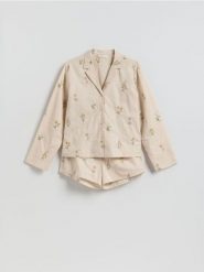 Dwuczęściowa piżama z lnem - kremowy. Białe piżamy Reserved, l, bez wzorów, z bawełny, bez kołnierzyka, bez ramiączek. Za 249.99 zł.