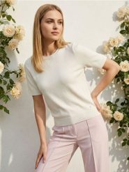 Bluzka swetrowa - kremowy. Białe bluzki Sinsay, l, bez wzorów, bez kołnierzyka, bez ramiączek. Za 29.99 zł.