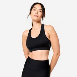 Stanik sportowy Domyos. Czarne biustonosze sportowe DOMYOS, bez wzorów, z elastanu, na jogę i pilates. Za 24.99 zł.