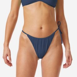 Dół kostiumu kąpielowego damski Roxy Tie Side Cheeky. Niebieskie bikini Roxy, bez wzorów, z tkaniny, sportowe. Za 69.99 zł.