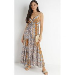 Jasnobeżowa Sukienka Olynome. Brązowe sukienki Born2be, l, bez wzorów, z wiskozy, boho, bez kołnierzyka, bez ramiączek, maxi, kopertowe. W wyprzedaży za 76.99 zł.