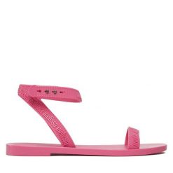 Sandały Melissa. Czerwone sandały Melissa, bez wzorów, bez obcasa, na płaskiej podeszwie, bez zapięcia. Za 299.99 zł.