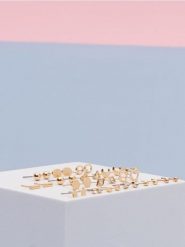 Kolczyki 17 pack - złoty. Żółte kolczyki Sinsay, złote. Za 15.99 zł.