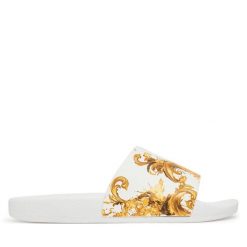 Klapki Versace Jeans Couture. Białe klapki Versace Jeans Couture, bez wzorów, z jeansu, bez obcasa, bez zapięcia. Za 359.99 zł.