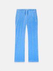 Juicy Couture Spodnie dresowe w kolorze błękitnym rozmiar: M. Niebieskie spodnie dresowe Juicy Couture, bez wzorów, z dresówki. Za 173.99 zł.