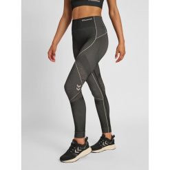 Damskie legginsy mid-rise Hummel MT Mila. Brązowe legginsy Hummel, bez wzorów, z dzianiny, sportowe. Za 201.30 zł.