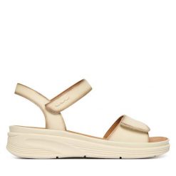 Sandały Josef Seibel. Białe sandały Josef Seibel, bez wzorów, bez obcasa, na koturnie, bez zapięcia. Za 399.99 zł.