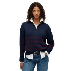Sweter z kołnierzem typu trucker dla kobiet Superdry. Niebieskie swetry Superdry, na zimę, bez wzorów, z dzianiny, bez ramiączek. Za 346.50 zł.