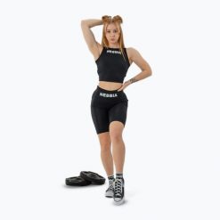 Top treningowy damski NEBBIA Gym Therapy Cropped. Czarne topy Nebbia, bez wzorów, bez kołnierzyka, bez ramiączek. Za 129.99 zł.