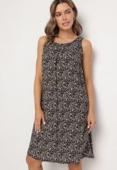 Czarna Rozkloszowana Sukienka z Bawełny w Abstrakcyjny Wzór Annivione. Czarne sukienki Born2be, na spotkanie biznesowe, l, bez wzorów, z bawełny, eleganckie, bez kołnierzyka, bez ramiączek, rozkloszowane. Za 39.99 zł.