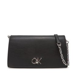 Torebka Calvin Klein. Czarne kopertówki Calvin Klein, bez wzorów, wizytowe, bez dodatków. Za 529.99 zł.