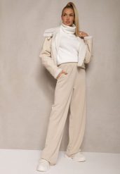 Beżowe Spodnie o Szerokim Kroju High Waist z Gumką w Pasie Belobira. Brązowe jeansy Renee, l, bez wzorów, z jeansu, eleganckie, z podwyższonym stanem, długie. W wyprzedaży za 107.99 zł.