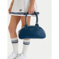 Torebka Reebok. Niebieskie torebki klasyczne Reebok, bez wzorów, klasyczne, bez dodatków. Za 199.99 zł.