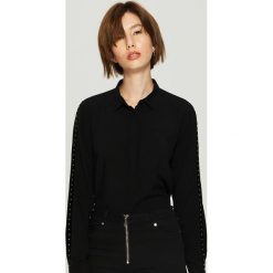 Koszula z lampasami - Czarny. Koszule marki DOMYOS. W wyprzedaży za 29.99 zł.