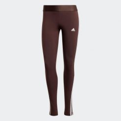 Legginsy fitness damskie ADIDAS. Fioletowe legginsy adidas, bez wzorów, z bawełny, sportowe. W wyprzedaży za 69.99 zł.