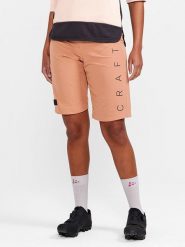 Craft Szorty kolarskie 3w1 "ADV Offroad" w kolorze pomarańczowym rozmiar: XL. Pomarańczowe szorty sportowe Craft, bez wzorów, z materiału, rowerowe. Za 260.99 zł.