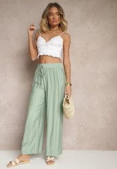 Miętowe Spodnie Typu Palazzo o Szerokim Kroju High Waist Ozdobione Wiązaniem Yaslevia. Zielone jeansy Renee, bez wzorów, z jeansu, eleganckie, z podwyższonym stanem. W wyprzedaży za 29.99 zł.
