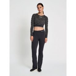 Damski crop top Hummel MT Saga. Czarne topy Hummel, l, bez wzorów, sportowe, bez kołnierzyka, bez ramiączek. Za 167.00 zł.