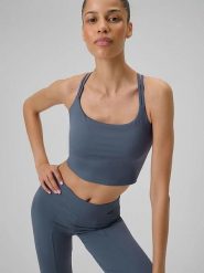 4F Top w kolorze niebieskim do jogi rozmiar: M. Niebieskie topy sportowe 4f, m, bez wzorów, z materiału, na jogę i pilates. Za 101.23 zł.