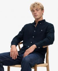 Superdry Klasyczna koszula Oxford z długim rękawem – 100% bawełna organiczna,. Niebieskie koszule Superdry, s, bez wzorów, z bawełny, klasyczne, bez kołnierzyka, bez ramiączek. Za 323.05 zł.
