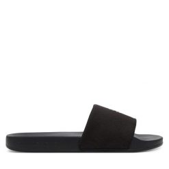 Klapki Calvin Klein Jeans. Czarne klapki Calvin Klein Jeans, bez wzorów, z jeansu, bez obcasa, bez zapięcia. Za 119.99 zł.
