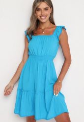 Niebieska Taliowana Sukienka z Wiskozą i Bawełną Falbankami oraz Gumką w Talii Hemvia. Niebieskie sukienki Born2be, na co dzień, l, bez wzorów, z bawełny, eleganckie, bez kołnierzyka, bez ramiączek, mini, kopertowe. W wyprzedaży za 37.49 zł.