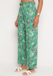 Zielone Spodnie z Bawełny z w Stylu Boho z Szerokimi Nogawkami i Gumką w Talii Jelvia. Zielone jeansy Born2be, na lato, l, bez wzorów, z bawełny, boho. Za 59.99 zł.