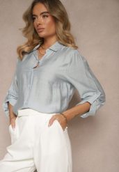 Jasnoniebieska Koszula o Kroju Oversize z Podpinanymi Rękawami Jenitta. Niebieskie koszule Renee, m, bez wzorów, z jeansu, eleganckie, bez kołnierzyka, bez ramiączek. W wyprzedaży za 41.99 zł.