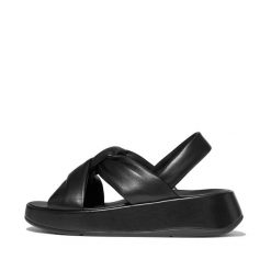 Sandały damskie FitFlop F-Mode Knot Soft-Leather Flatform B/Strap. Czarne sandały Flip Flop, bez wzorów, z materiału, eleganckie, bez obcasa, na płaskiej podeszwie, bez zapięcia. Za 577.90 zł.