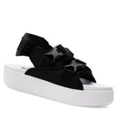 Sandały Puma. Czarne sandały Puma, bez wzorów, bez obcasa, na koturnie, bez zapięcia. Za 229.99 zł.