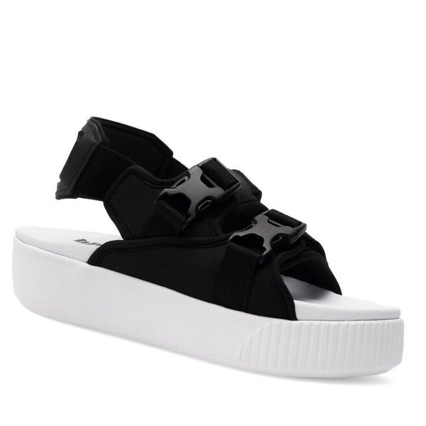 Sandały Puma. Czarne sandały Puma, bez wzorów, bez obcasa, na koturnie, bez zapięcia. Za 229.99 zł.