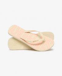 Superdry Klapki Core Logo z gumy – RICE WHITE/CORAL. Białe klapki Superdry, bez wzorów, bez obcasa, bez zapięcia. Za 134.00 zł.