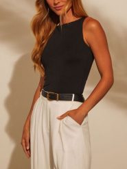 Milan Kiss Top w kolorze czarnym rozmiar: L. Czarne topy Milan Kiss, l, bez wzorów, z bawełny, bez kołnierzyka, bez ramiączek. Za 113.99 zł.