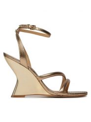 MICHAEL Michael Kors Sandały Nadina Wedge 40R4NDHS2M Złoty. Żółte sandały MICHAEL Michael Kors, bez wzorów, ze skóry, bez obcasa, na koturnie, bez zapięcia. Za 1,049.00 zł.