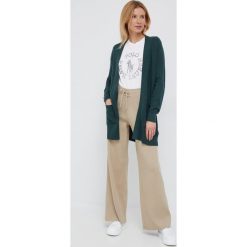 Tommy Hilfiger spodnie damskie kolor beżowy. Brązowe spodnie materiałowe Tommy Hilfiger, bez wzorów, z bawełny, z podwyższonym stanem. W wyprzedaży za 510.99 zł.