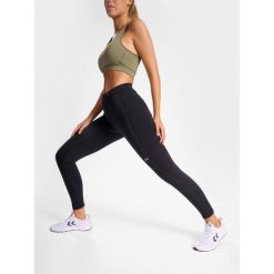 Damskie legginsy Newline core warm. Czarne legginsy Newline, bez wzorów, z dżerseju, sportowe. Za 240.00 zł.