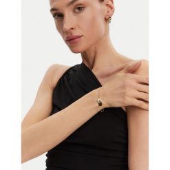 Bransoletka Guess. Żółte bransoletki Guess, złote. Za 149.99 zł.