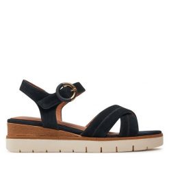 Sandały Tamaris. Niebieskie sandały Tamaris, bez wzorów, bez obcasa, na koturnie, bez zapięcia. Za 349.99 zł.
