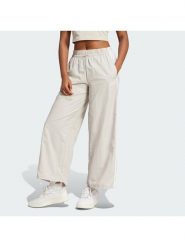 Adidas Spodnie dresowe Essentials 3-Stripes JC8168 Beżowy Loose Fit. Brązowe spodnie sportowe adidas, bez wzorów, z dresówki. Za 219.99 zł.