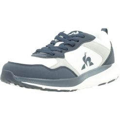 Buty LE COQ SPORTIF 2422716L Niebieski. Niebieskie buty trekkingowe Le Coq Sportif, bez wzorów, z tkaniny, bez zapięcia, trekkingowe. Za 210.80 zł.