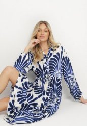 Niebieska Sukienka z Wiskozą o Rozkloszowanym Kroju z Motywem Roślinnym Korisaria. Niebieskie sukienki Born2be, na co dzień, l, bez wzorów, z wiskozy, eleganckie, bez kołnierzyka, bez ramiączek, maxi, kopertowe. W wyprzedaży za 101.99 zł.
