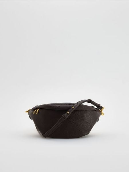 Saszetka crossbody - brązowy. Brązowe nerki i saszetki Reserved, bez wzorów, ze skóry, bez dodatków. Za 99.99 zł.