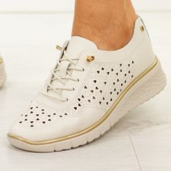 Beżowe skórzane ażurowe półbuty damskie Filippo Dp6714/26. Brązowe półbuty wsuwane Filippo, na jesień, w ażurowe wzory, z jeansu, z okrągłym noskiem, bez obcasa, na koturnie. Za 219.00 zł.