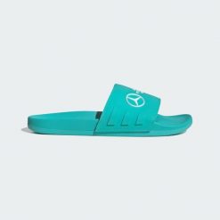 Klapki Mercedes - AMG Petronas Formula One Team adilette Comfort. Białe klapki adidas, bez wzorów, klasyczne, bez obcasa, bez zapięcia. Za 239.00 zł.