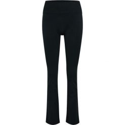 Damskie legginsy Hummel Hiit Seamless Flare. Czarne legginsy Hummel, bez wzorów, sportowe, długie. Za 273.00 zł.