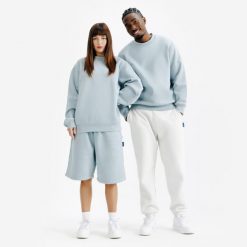 Bluza z okrągłym dekoltem unisex Elementals. Niebieskie bluzy Decathlon, m, bez wzorów, z bawełny, bez ramiączek, bez kaptura. Za 149.99 zł.