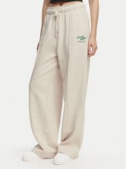 Tommy Hilfiger Spodnie dresowe Logo Exaggerated Seam WW0WW50783 Kremowy Relaxed Fit. Białe spodnie dresowe Tommy Hilfiger, bez wzorów, z bawełny. Za 649.99 zł.