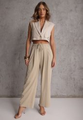 Beżowe Szerokie Spodnie Wiskozą Bawełną i Elastyczną Talią ze Sznurkiem Arkinae. Brązowe jeansy Renee, m, bez wzorów, z bawełny, z podwyższonym stanem. Za 74.99 zł.