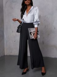 LA Angels Spodnie w kolorze czarnym rozmiar: S. Czarne spodnie materiałowe LA Angels, bez wzorów, z materiału, z podwyższonym stanem. Za 187.52 zł.